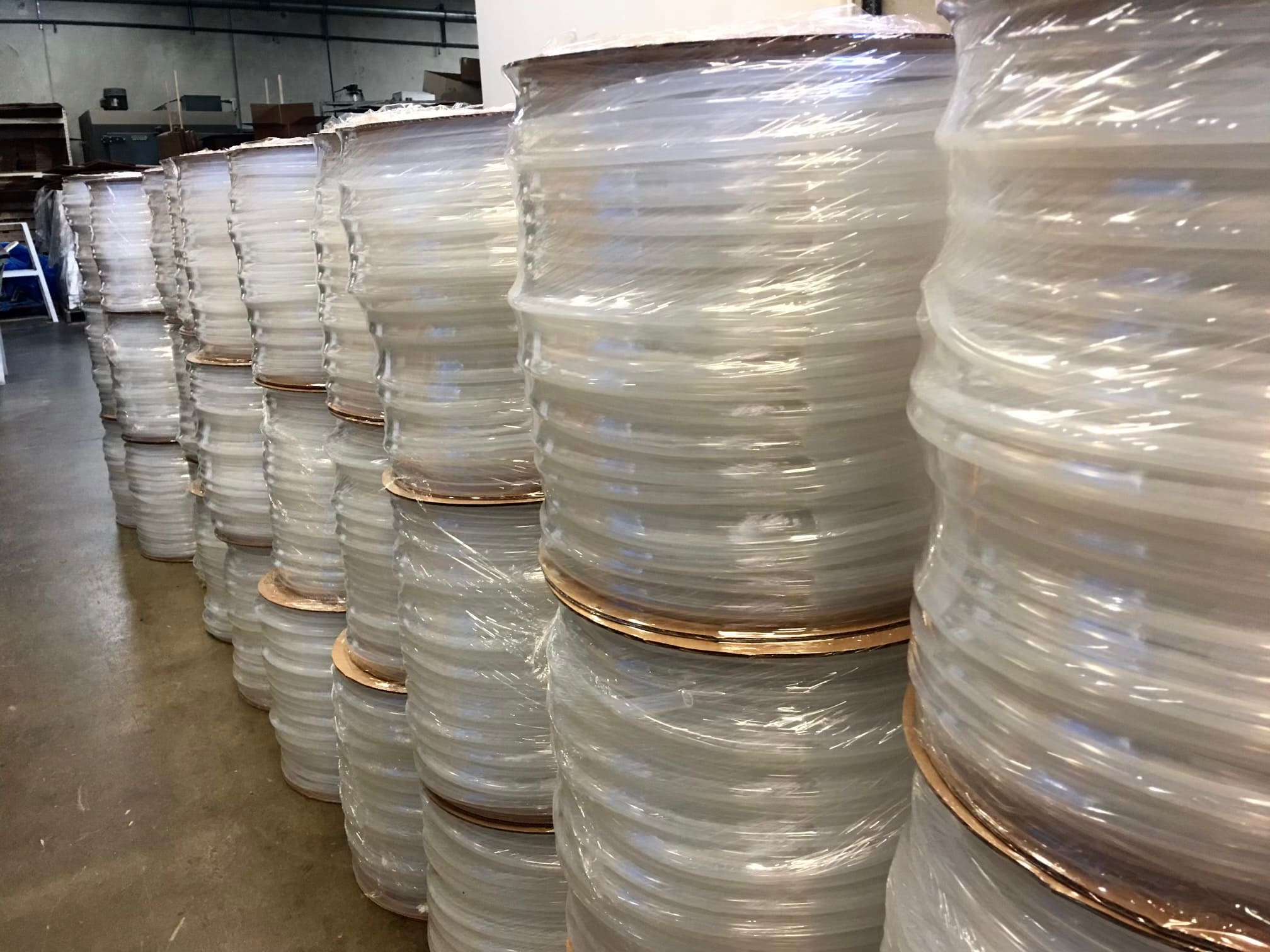 Stacks of spools of clear silicone rubber tubing